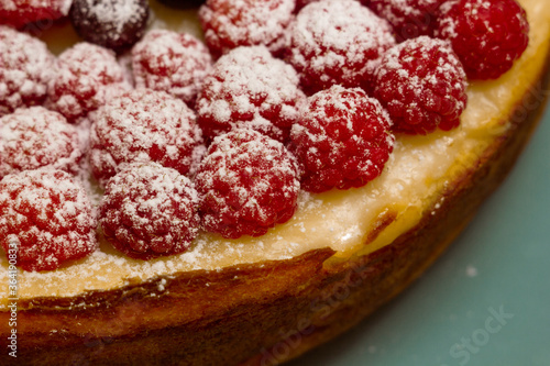 Homemade Cheesecake with Fresh Raspberries and Currants - Healthy Organic Summer Dessert Cheesecake Pie. Vanilla Cheese Cake with Wild Berry