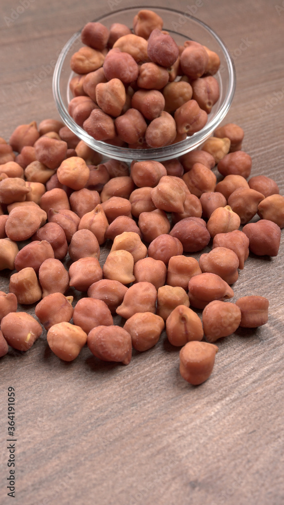 Black Chickpeas or Kala Chana with chana dal pulse isolated on wooden Background. Black Chickpeas or Kala Chana with chana dal pulse isolated on wooden Background.