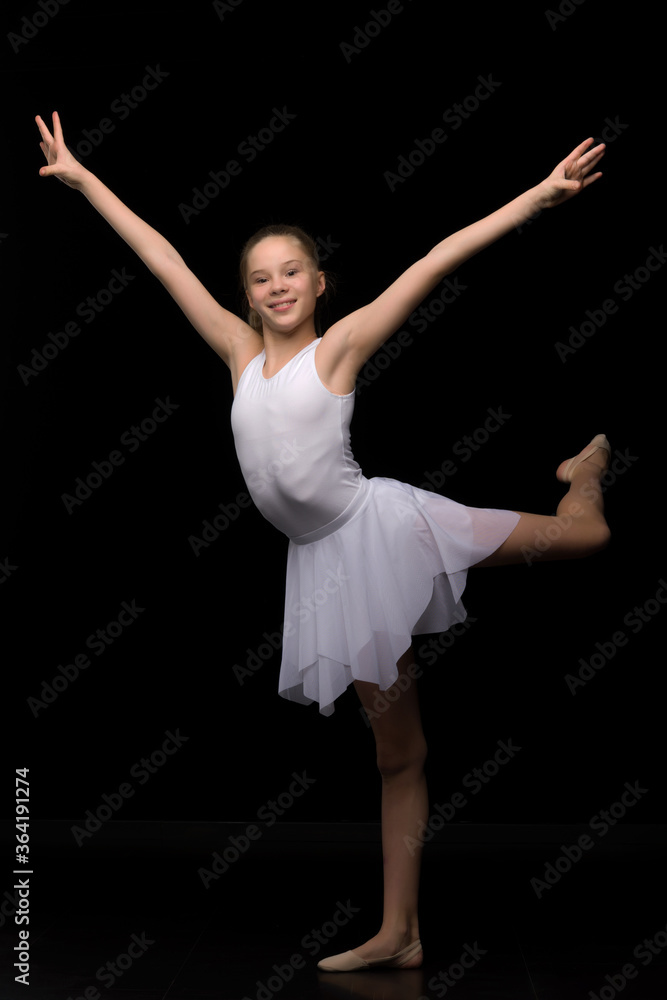 Full length portrait of a charming gymnast girl in elegant dress. Full length portrait of a charming gymnast girl in elegant dress.