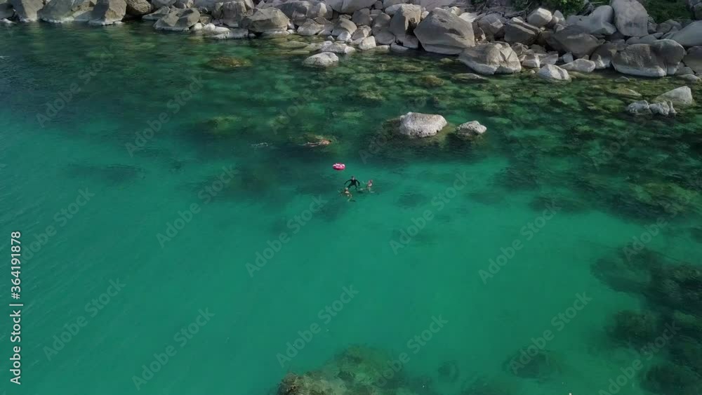 aerial freedivers in the water koh tao thailand island coastline snorkeling aerial freedivers in the water koh tao thailand island coastline snorkeling
