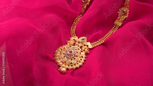 Indian Traditional gold Jewellery on beautiful background.
