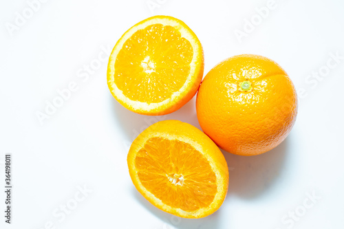 Sliced fresh orange fruit on white background