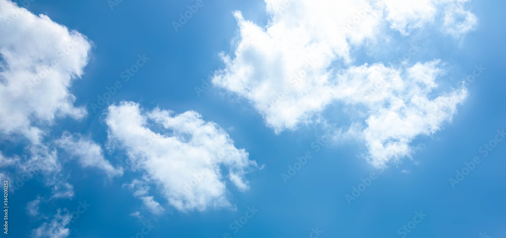 Blue sky with white clouds.soft bright clouds in blue sky with sun light