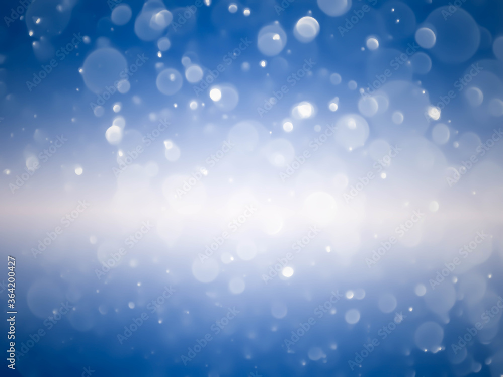 blue background with soft bokeh lights. blue background with soft bokeh lights.