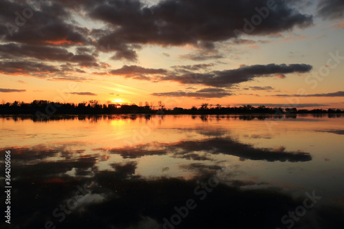 Fototapeta Naklejka Na Ścianę i Meble -  Colorful sunset by the Odra River, Poland.