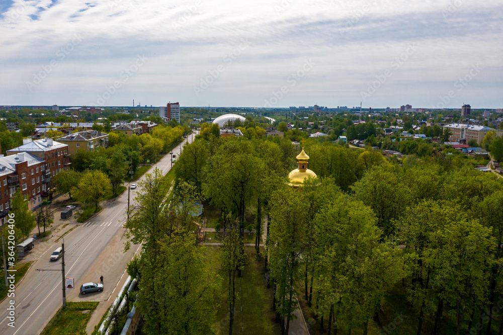 The golden dome of the chapel in the park of the Assumption Cathedral in the city of Ivanovo.