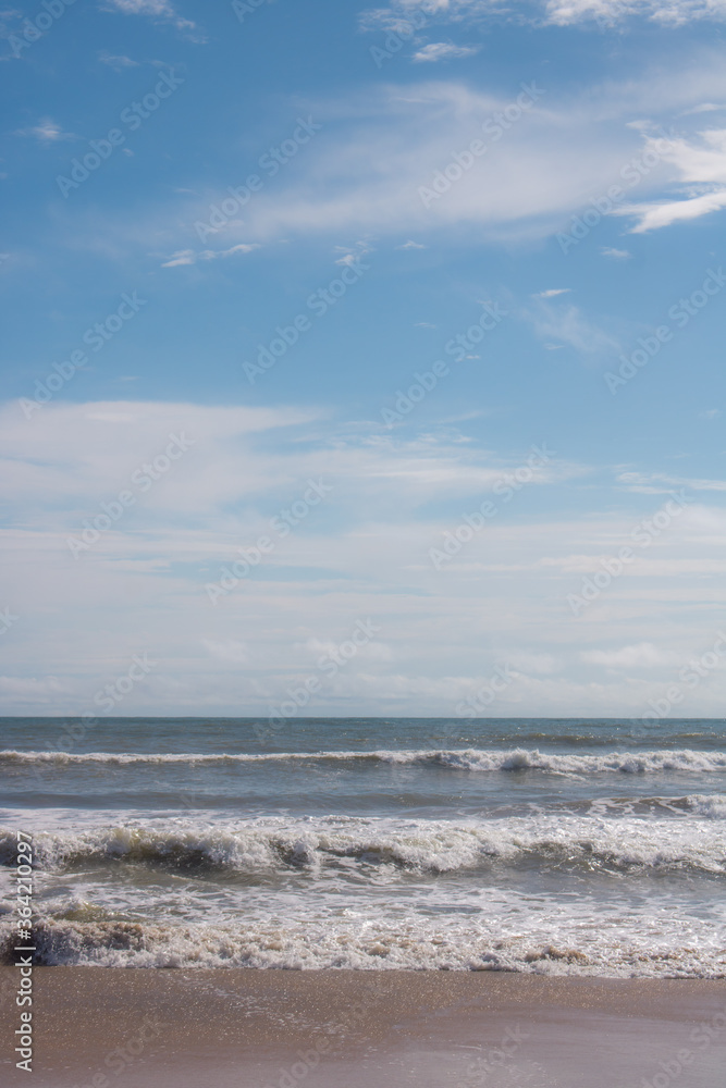 View of a sea / beach, horizon and the sky.