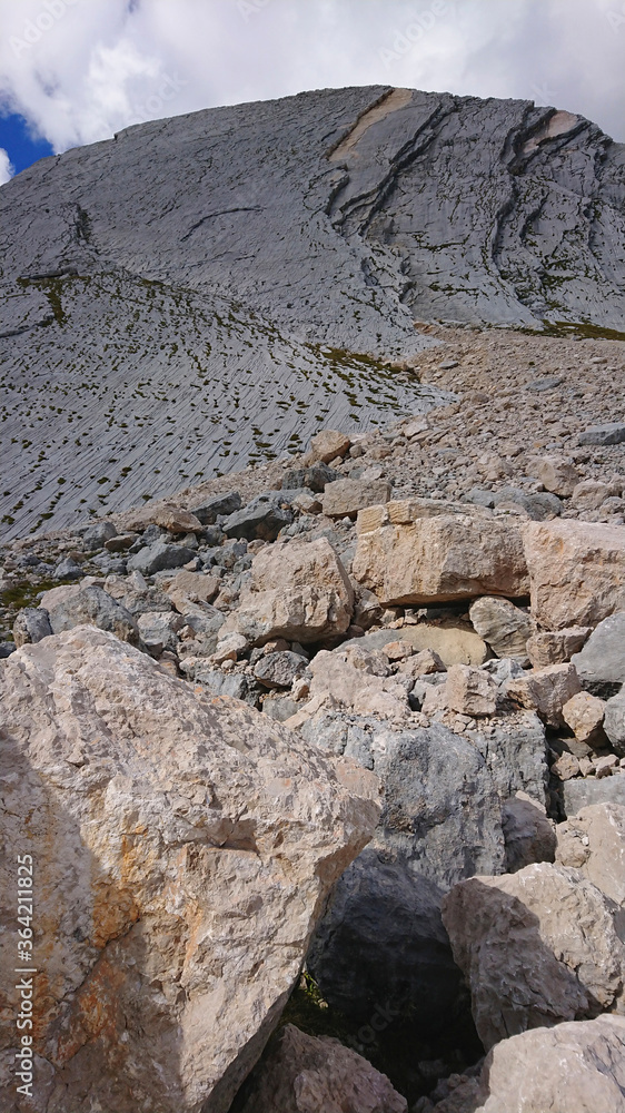 Limestone stones of the Italian Dolomites. Close up with natural shadows Limestone stones of the Italian Dolomites. Close up with natural shadows