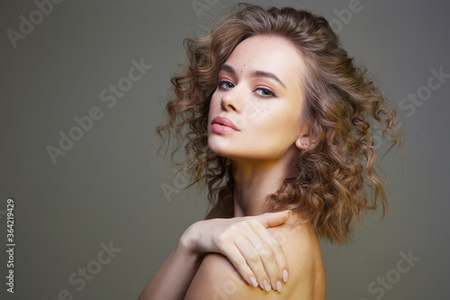 Fotografie, Obraz Beautiful young woman. amazing curly girl with make-up