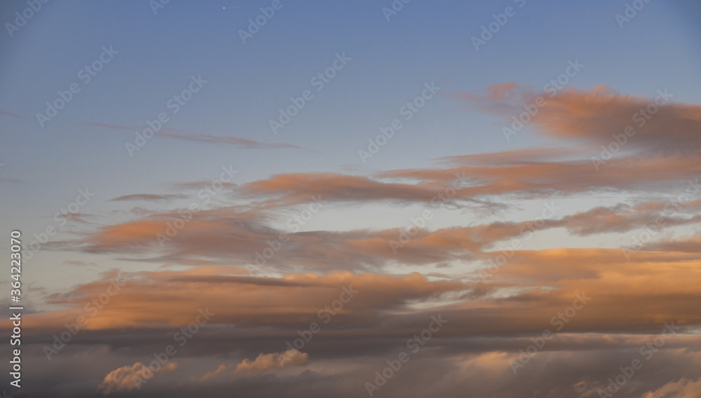 Fototapeta premium clouds in the sky while the golden hour