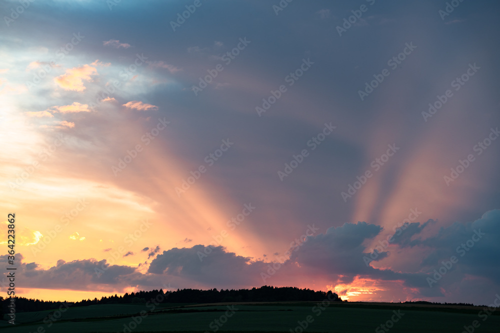 clouds in the sky while the golden hour