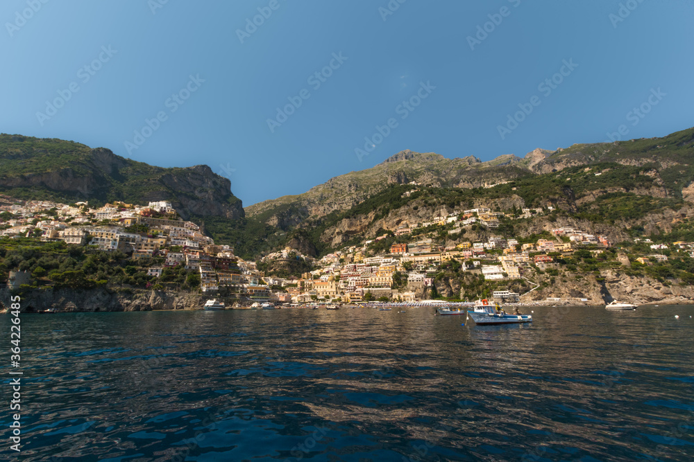 Boats stanting right outside the major beach of Positano city, Amalfi coast, Campania, South Italy.