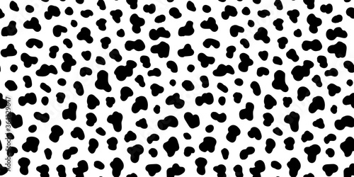 Dalmatian dog skin texture seamless pattern. Black and white spotted background. Animal print design. Vector illustration. 