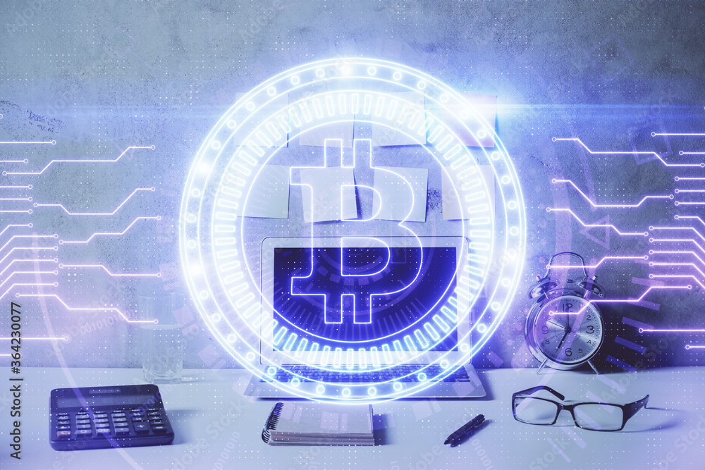 Double exposure of blockchain and crypto economy theme hologram and table with computer background. Concept of bitcoin cryptocurrency. Double exposure of blockchain and crypto economy theme hologram and table with computer background. Concept of bitcoin cryptocurrency.