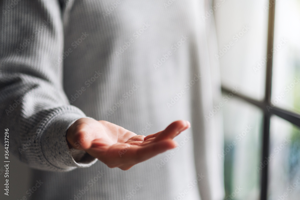 Closeup image of a woman showing open hand palm with copy space for text or productCloseup image of a woman showing open hand palm with copy space for text or product Closeup image of a woman showing open hand palm with copy space for text or productCloseup image of a woman showing open hand palm with copy space for text or product