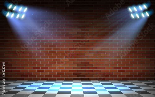 blue spotlight on the brick wall in the studio room