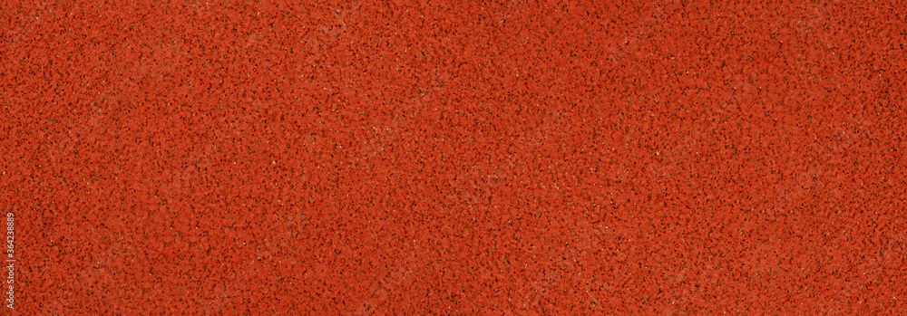 Fototapeta premium Top view of Orange running track texture grunge background.
