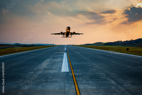 Wallpaper Mural passenger plane fly up over take-off runway from airport Torontodigital.ca