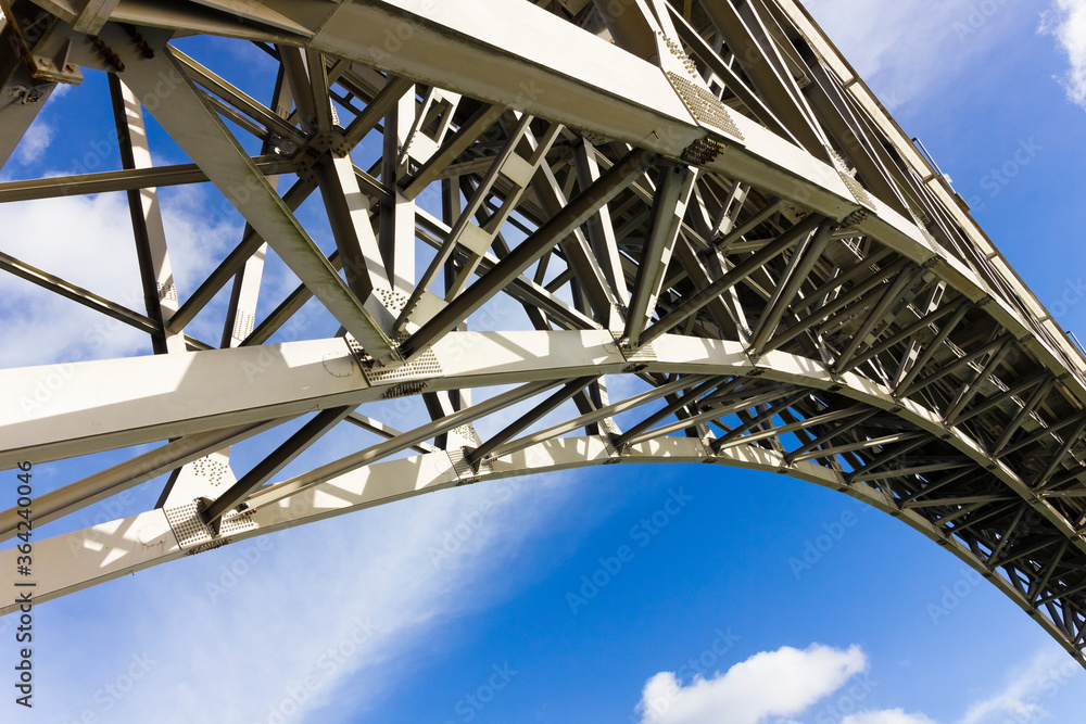 Iconic steel curve of Britannia Bridge a Grade II Listed structure, Isle of Anglesey, North Wales Iconic steel curve of Britannia Bridge a Grade II Listed structure, Isle of Anglesey, North Wales