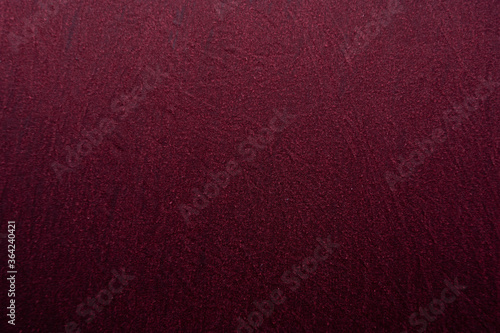background dark red texture of wet fabric