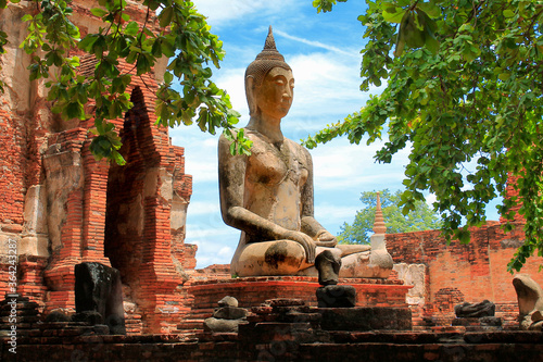 Old buddha image at wat mahathat ancient sites in ayutthaya province.