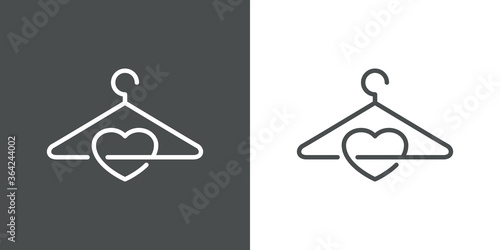 Concepto tienda de ropa. Logo lineal percha y corazón en fondo gris y fondo blanco