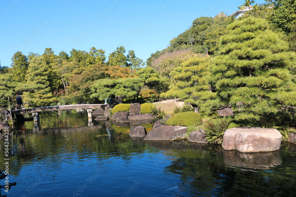 HIMEJI JAPAN OCTOBER 12 2019 toro Japanese stone lantern Kōko-en garden near Himeji Castle japan,