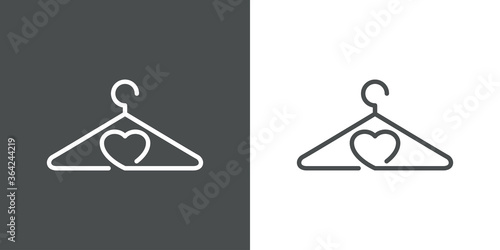 Concepto tienda de ropa. Logo lineal percha y corazón en fondo gris y fondo blanco