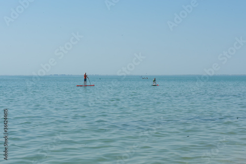 Kayaking. People are floating on a sea kayak. Adventure on the water.