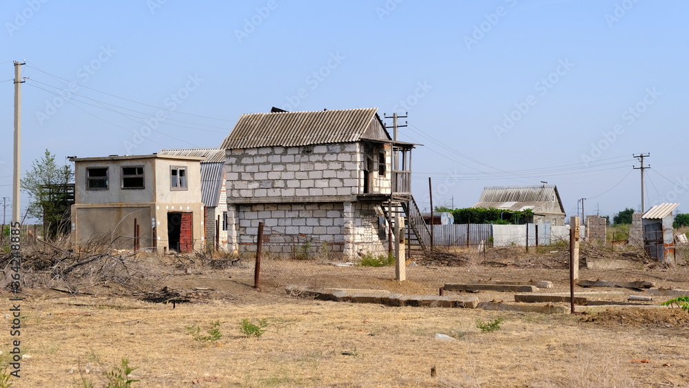 Abandoned houses on personal plots in Russia.
Abandoned houses on personal plots in Russia.