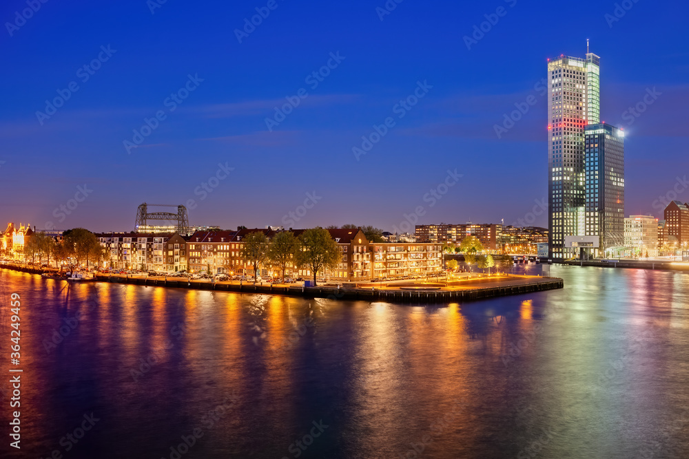 Rotterdam City Skyline Night Time River View In Netherlands