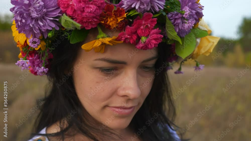 Beautiful Woman Opens Eyes and Finds out She Appeared in Field Dressed White Folk Dress Listening Musicians. Slow motion Beautiful Woman Opens Eyes and Finds out She Appeared in Field Dressed White Folk Dress Listening Musicians. Slow motion