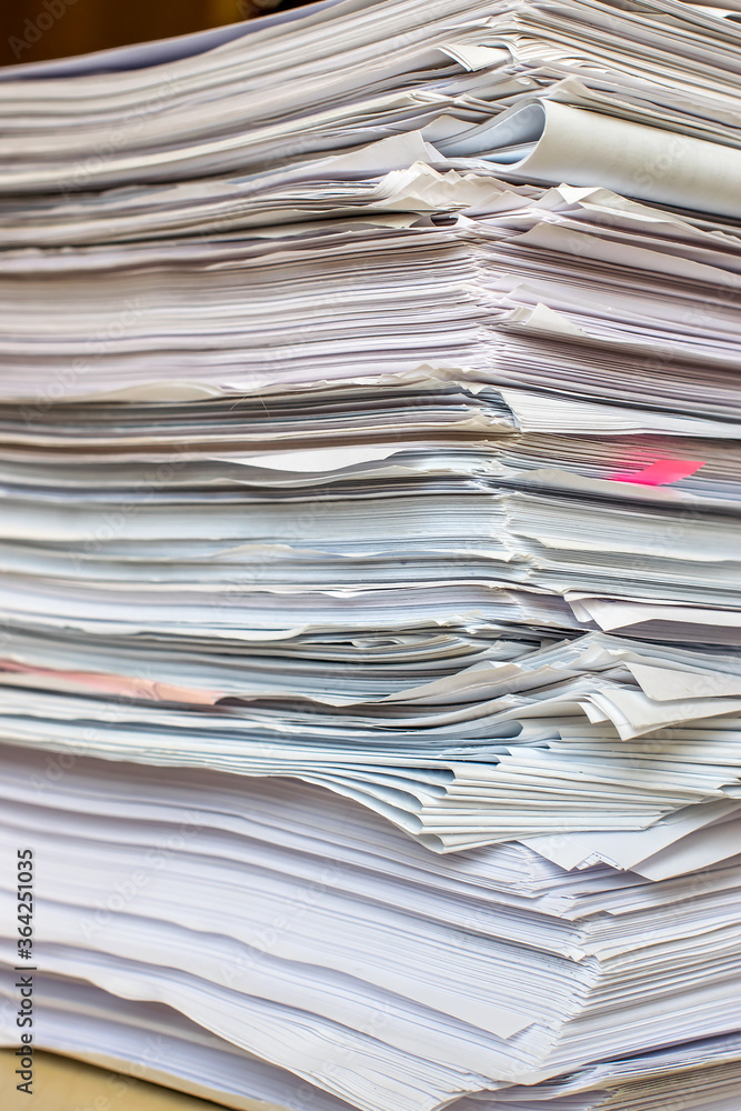 bundles bales of paper documents. stacks packs pile on the desk in the office bundles bales of paper documents. stacks packs pile on the desk in the office