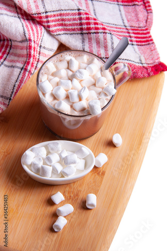 Composition with delicious hot cocoa drink and marshmallows on wooden background, flat lay
