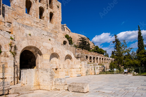 Stone facade and arcades of Odeon of Herodes Atticus Roman theater, Herodeion or Herodion, at slope of Athenian Acropolis hill in Athens, Greece photo