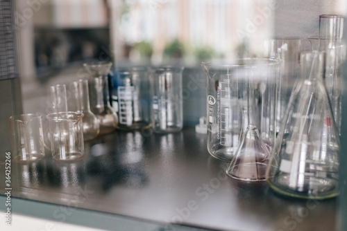 Test tubes and beakers in a chemical laboratory. Chemical laboratory. Dishes for experiments.