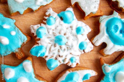 Delicious gingerbread cookies with white and blue fondant made grandma's favorite grandchildren for Christmas.