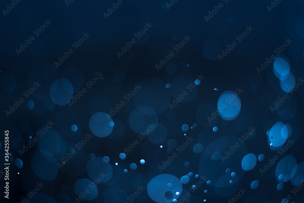 abstract sparkle bokeh light effect with navy blue background Stock ...