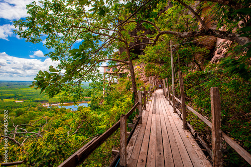 Background of wooden walkways  wooden bridges  created for high-angle views on mountains  natural attractions  or parks that have forest preservation