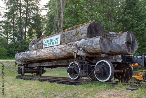 British Columbia, Canada - 07/01/2019: Canada Day sign on a trainwagon with wooden logs photo