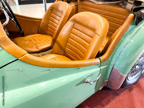 a classic car seat with brown leathers, Bangkok Thailand