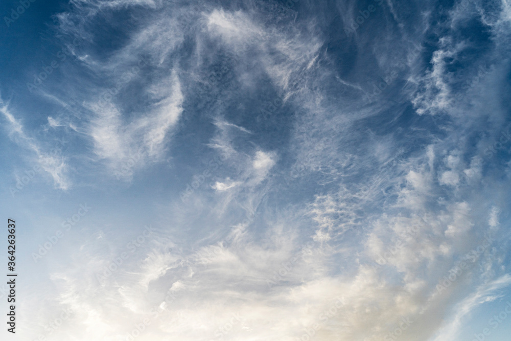 Obraz premium Blue sky with clouds - natural background for environmental and weather concepts, deep blue sky and space