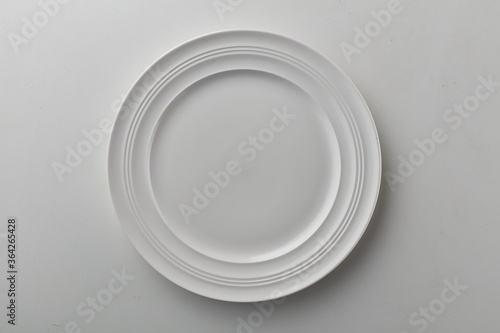 Top view shot of white circular plate.