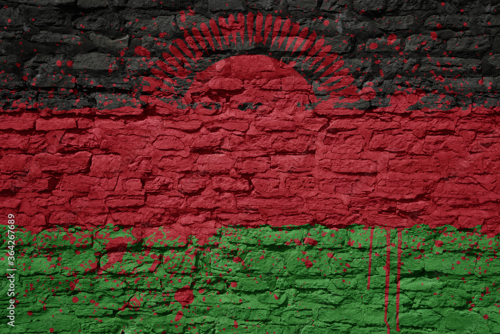 painted big national flag of malawi on a massive old brick wall painted big national flag of malawi on a massive old brick wall
