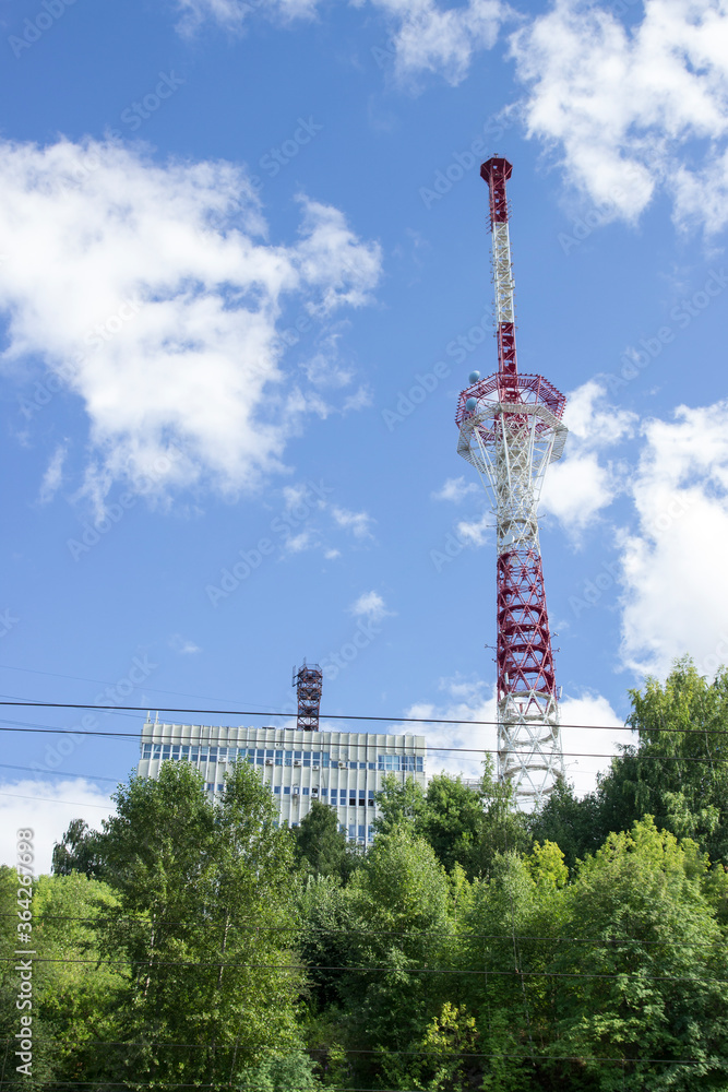 TV telecommunication tower on the summit of mountain.