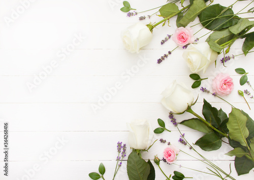 Flowers flat design. Pink and white roses and lavender flowers on white wooden board. Lavender mock up, provence template, lavender template for greeting cards
