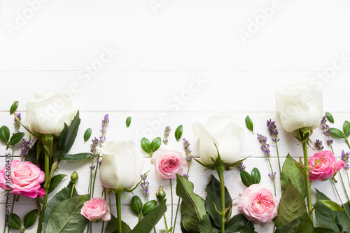 Flowers flat design. Pink and white  roses and lavender flowers on white wooden board. Lavender  mock up, provence template, lavender template for greeting cards, wedding layout