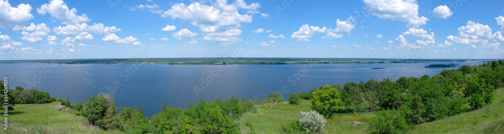 Panoramic view of the nature of trees and the river. Countryside.