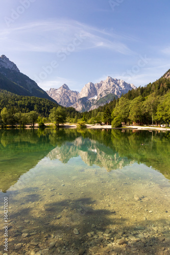Lake Jasna mountains reflection water Kranjska Gora Slovenia.