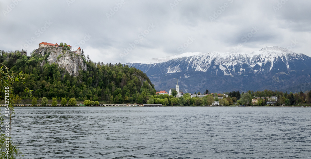 Lake Bled snow white mountains alps castle rock church
